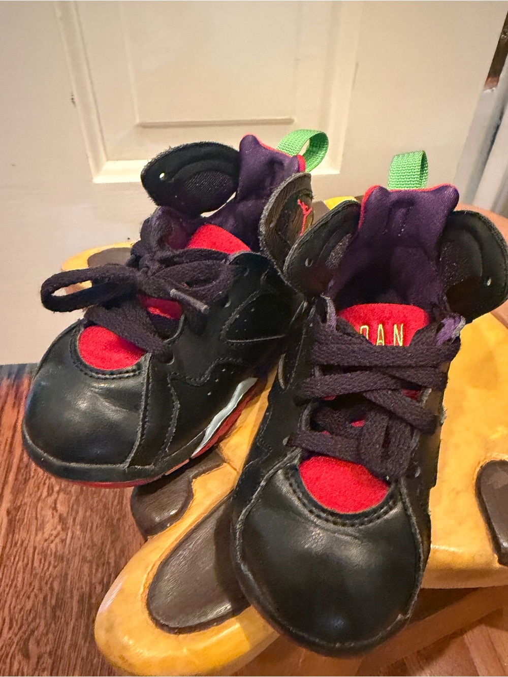 Jordan Kids Black Sneakers with Red and Purple Accents